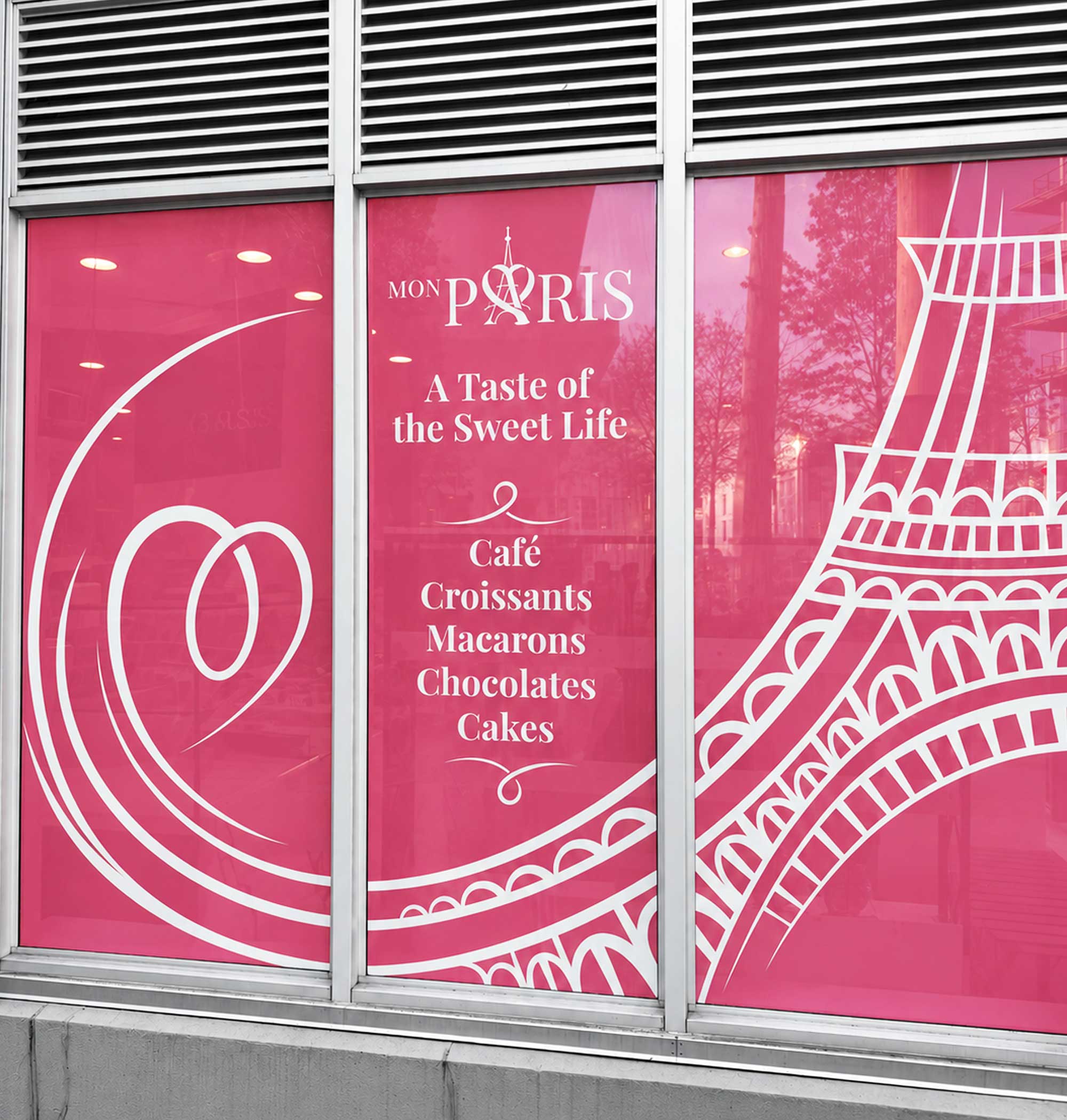 Centre window panel with the Mon Paris logo, “A Taste of the Sweet Life” tagline, and a menu of café, croissants, and macarons.